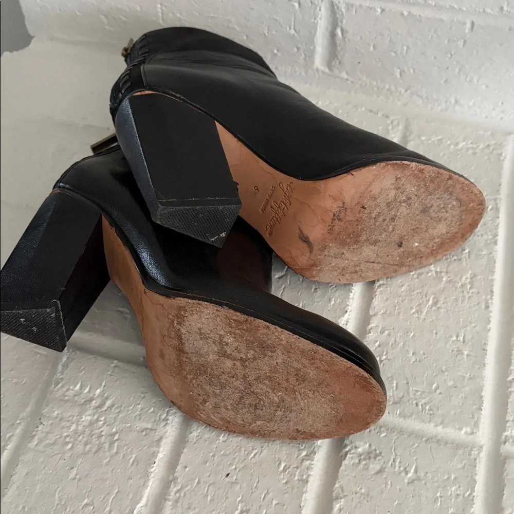 Leather Black booties with zipper back